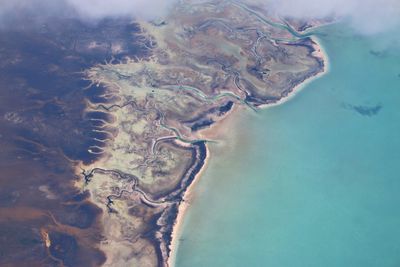 High angle view of surf on beach