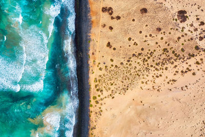 High angle view of sand on beach