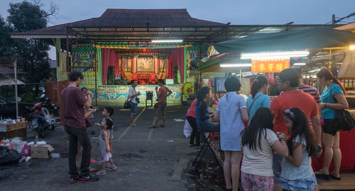 People at entrance of temple