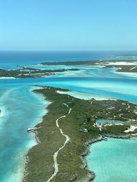 Scenic view of sea against clear blue sky