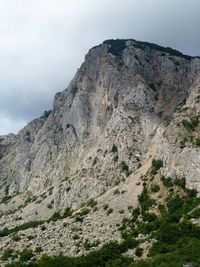 Rock formations on mountain against sky