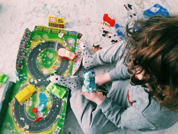 High angle view of various toys on wall