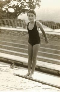 Portrait of young woman in water