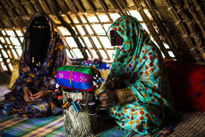 Women making dress