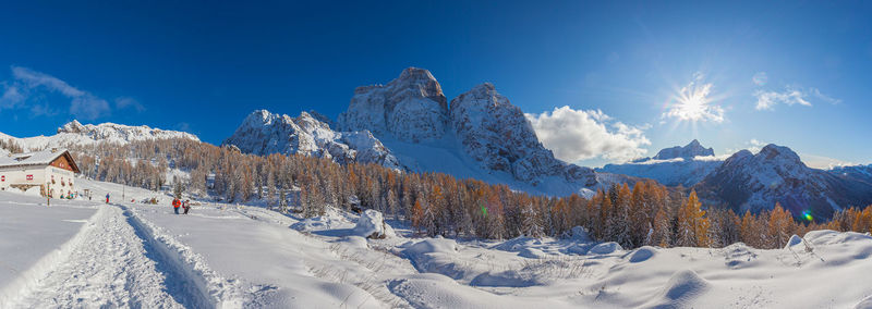 Beautiful winter panorama of the citta' di fiume hut in front of mount pelmo, dolomites, italy