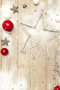 High angle view of decoration on fake snow over table