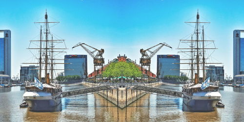 Built structures against clear blue sky