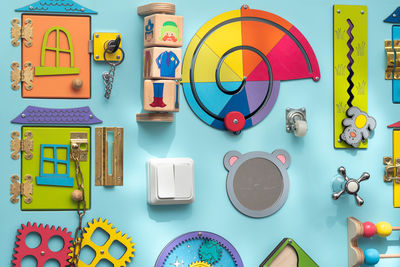 Directly above shot of various objects on yellow background