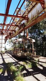 Train on railroad track against sky