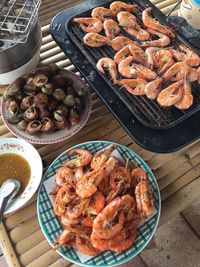 High angle view of meat in plate on table