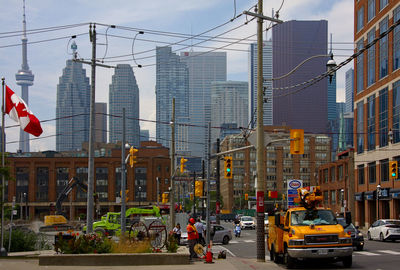 City street and modern buildings against sky