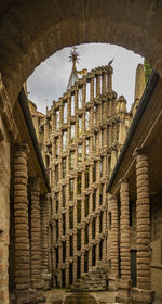 Low angle view of old building against sky