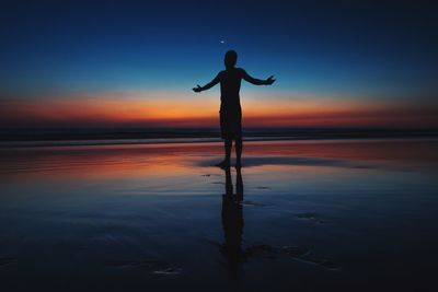 Scenic view of sea at sunset