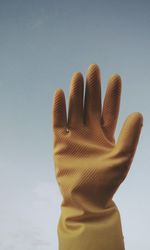 Close-up of human hand against white background