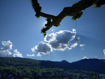 Scenic view of mountains against blue sky