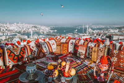 Rooftop view with traditional carpet and turkish tea. top view of the city of istanbul
