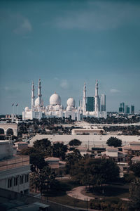 View of buildings in city against sky