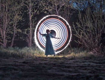 Full length of man standing on field