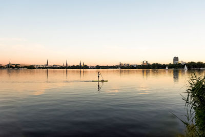 Scenic view of lake against sky during sunset