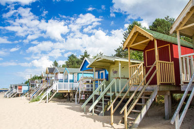 Built structure on beach against sky