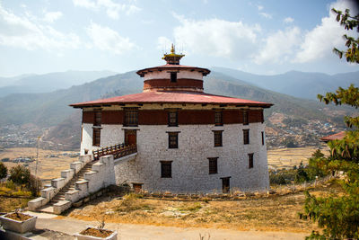 View of building against cloudy sky