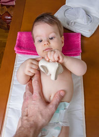 Portrait of baby girl at home