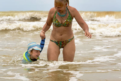 Full length of girl on beach