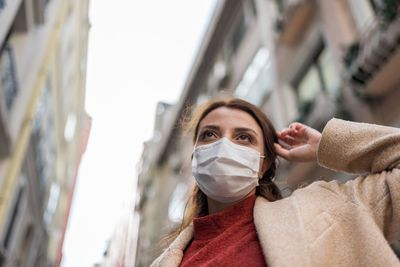 Low angle view of a young woman