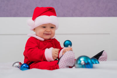 Portrait of cute boy playing with toy