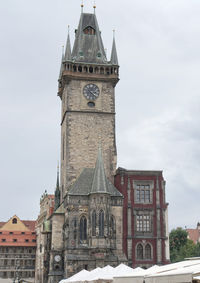 Clock tower of historic building against sky