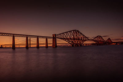 View of suspension bridge at night