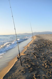 Scenic view of beach against clear sky