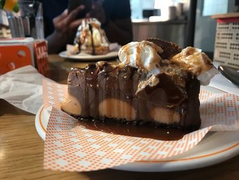 Close-up of cake served on table