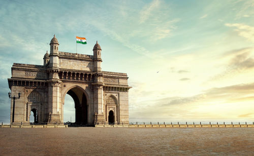 View of historical building against cloudy sky