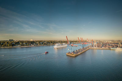 The port of hamburg at sunset with cruise ship