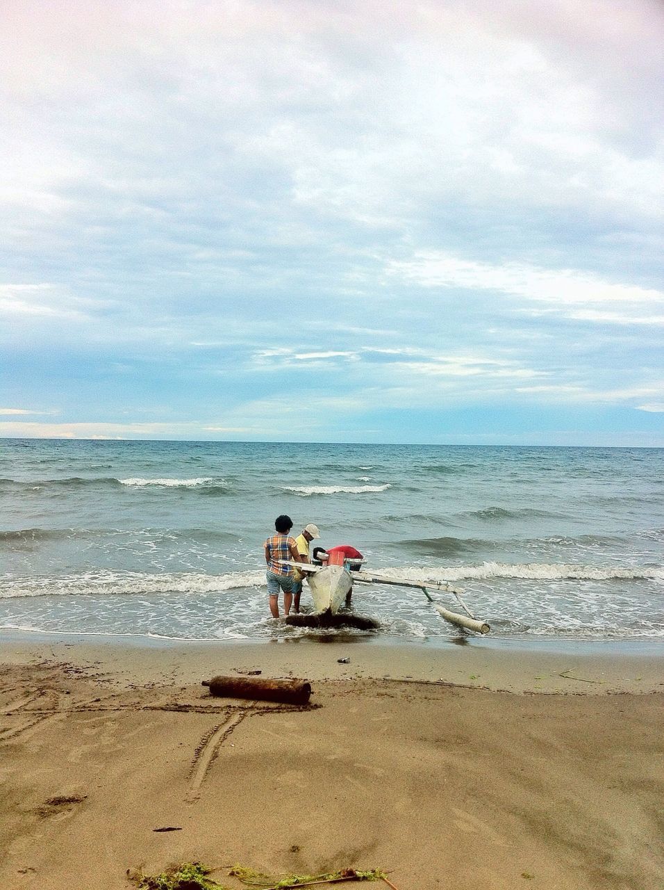 sea, beach, horizon over water, sand, water, shore, sky, transportation, nautical vessel, mode of transport, tranquility, boat, tranquil scene, cloud - sky, scenics, nature, beauty in nature, vacations, day