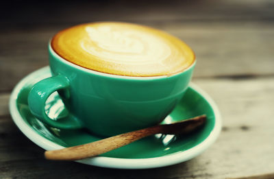 Close-up of cappuccino on table