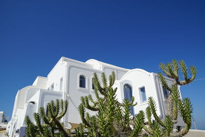 Low angle view of cathedral against clear blue sky