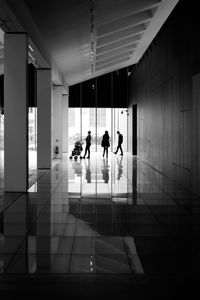 People walking in modern building