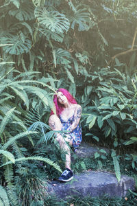 Full length of girl with plants