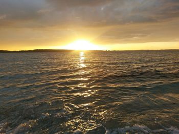 Scenic view of sea during sunset