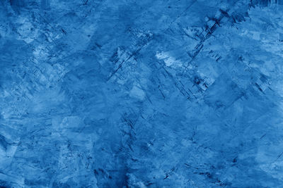 Concrete texture blue background, flat lay, top view, copy space.