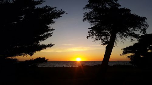 Scenic view of sea at sunset