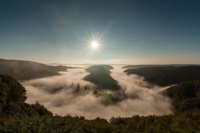 Sun shining through clouds