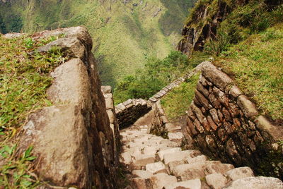 High angle view of stone staircase against mountain at machu picchu