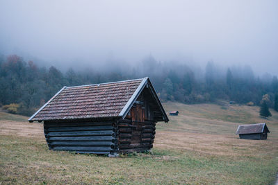 House on field against sky