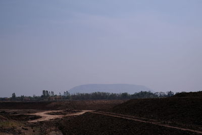 Scenic view of field against clear sky