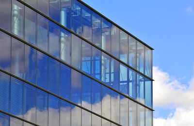 Low angle view of modern building against sky