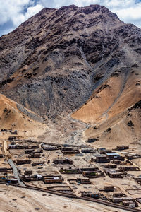 Aerial view of landscape and mountains against sky