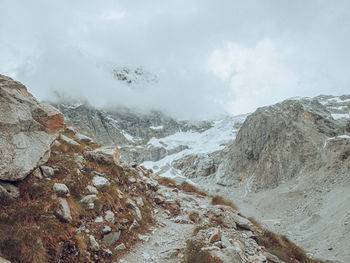 Scenic view of mountains against sky during winter